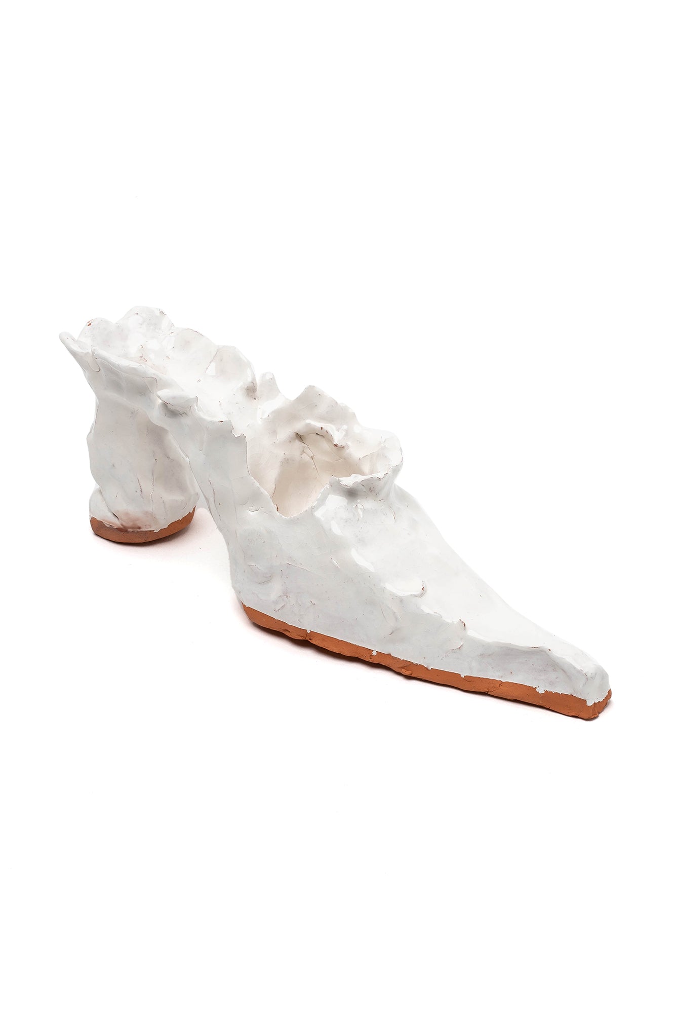 CARLA MILENTIS - Ceramic White Heel Sculpture - Error404store. White ceramic sculpture of a heel. Handmade by Melbourne based artist Carla Lementis, sold in Melbourne boutique called Error404store.