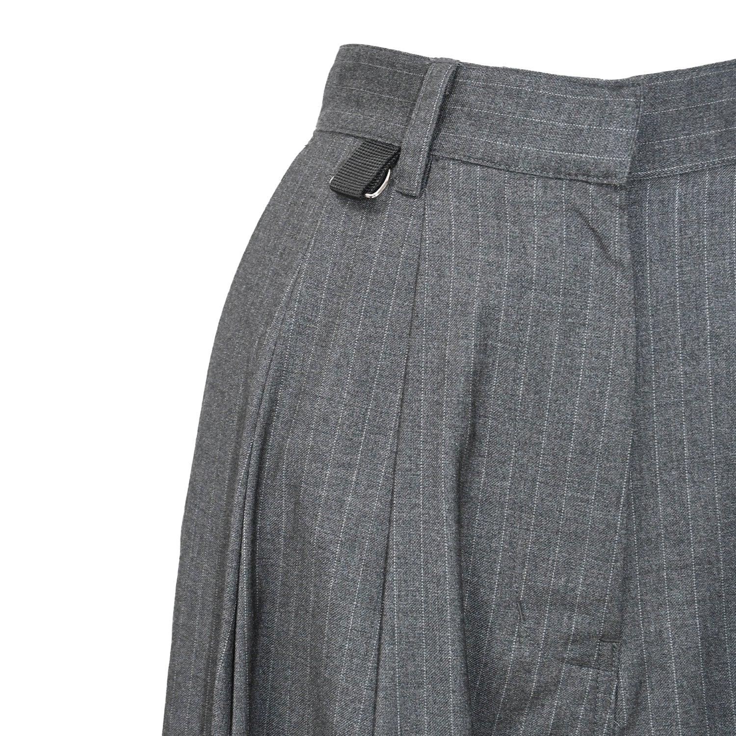 detail of D-ring on ESS.BEE pin-stripe pants in Grey