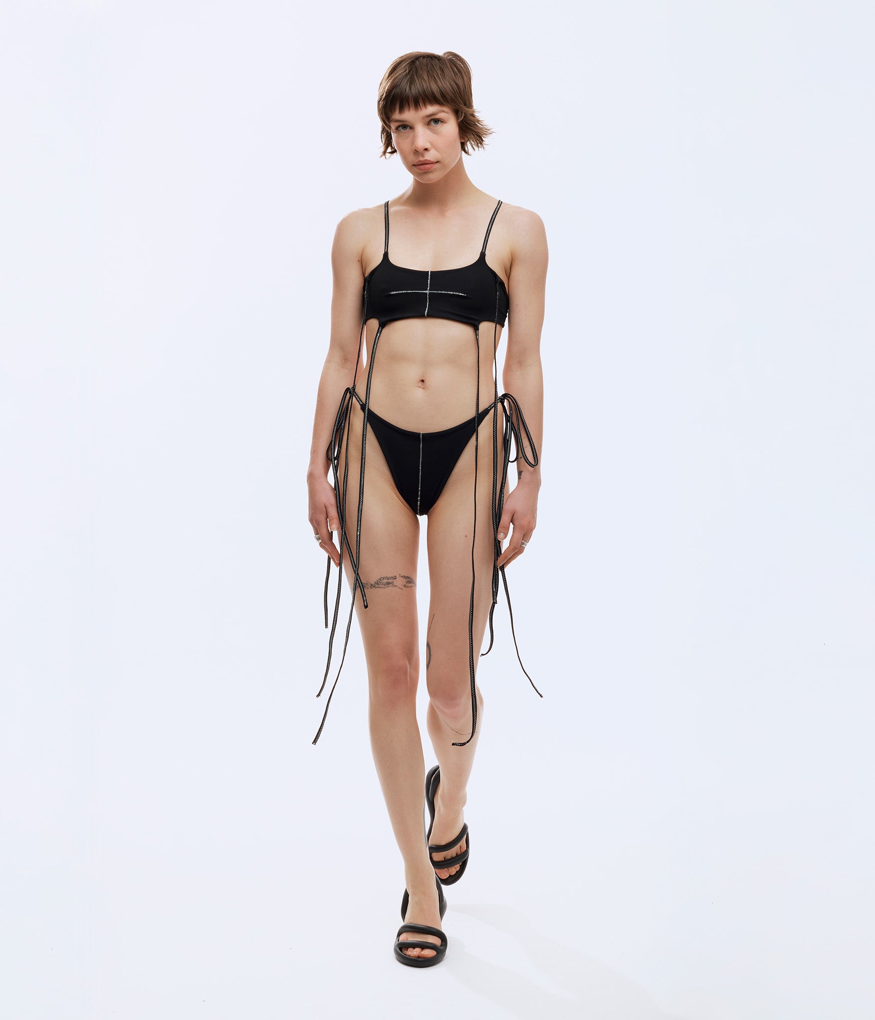 Black bikini top with white contrast stitching. Made by Australian independent designer, BRB, and sold in Melbourne clothing boutique called Error404store.